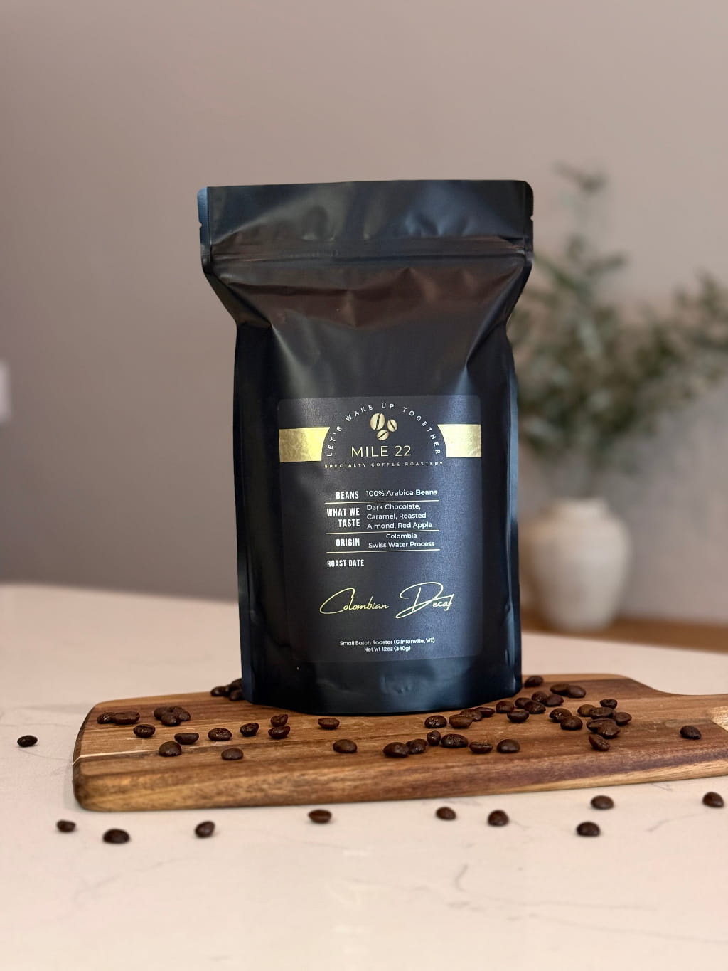 Buy Colombian decaf coffee beans online made with 100% Arabica beans using Swiss Water Process, featuring dark chocolate, caramel, roasted almond, and red apple notes for a smooth flavorful cup without caffeine
