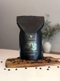 Buy Crossroads to the Northwoods coffee beans online made from 100% Arabica, freshly roasted with chocolate, tobacco, and smoky notes, perfect for bold rich coffee and everyday brewing