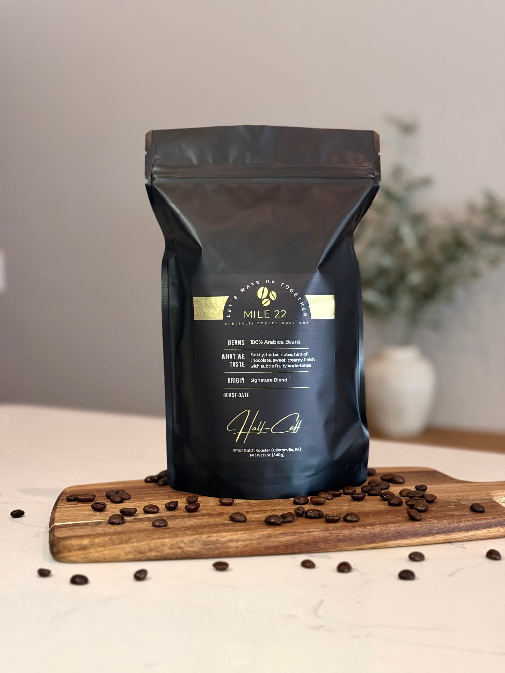 Buy half caff coffee beans online made from 100% Arabica, freshly roasted with smooth balanced flavor, chocolate notes, and light herbal undertones, perfect for low caffeine coffee lovers