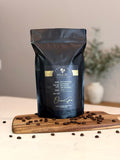 Buy Orchard Grove coffee beans online made from 100% Arabica, freshly roasted with dark chocolate, almond, and citrus notes, perfect for smooth balanced coffee and daily brewing